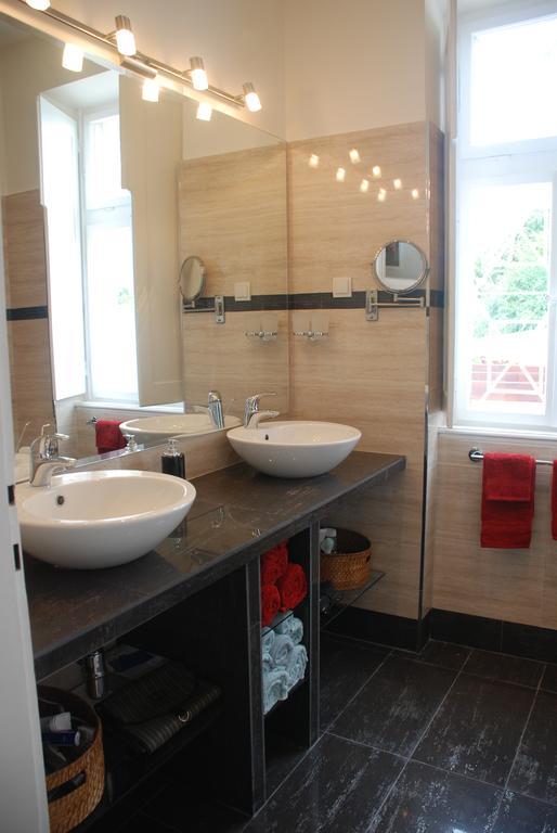 Modern bathroom with double vessel sinks